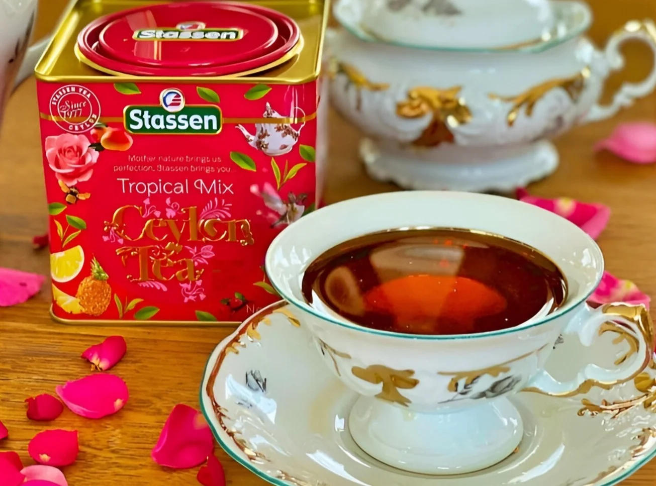 Stassen Tropical Mix Ceilonas melnā tēja ar augļu aromātiem 100g metāla skārdene
