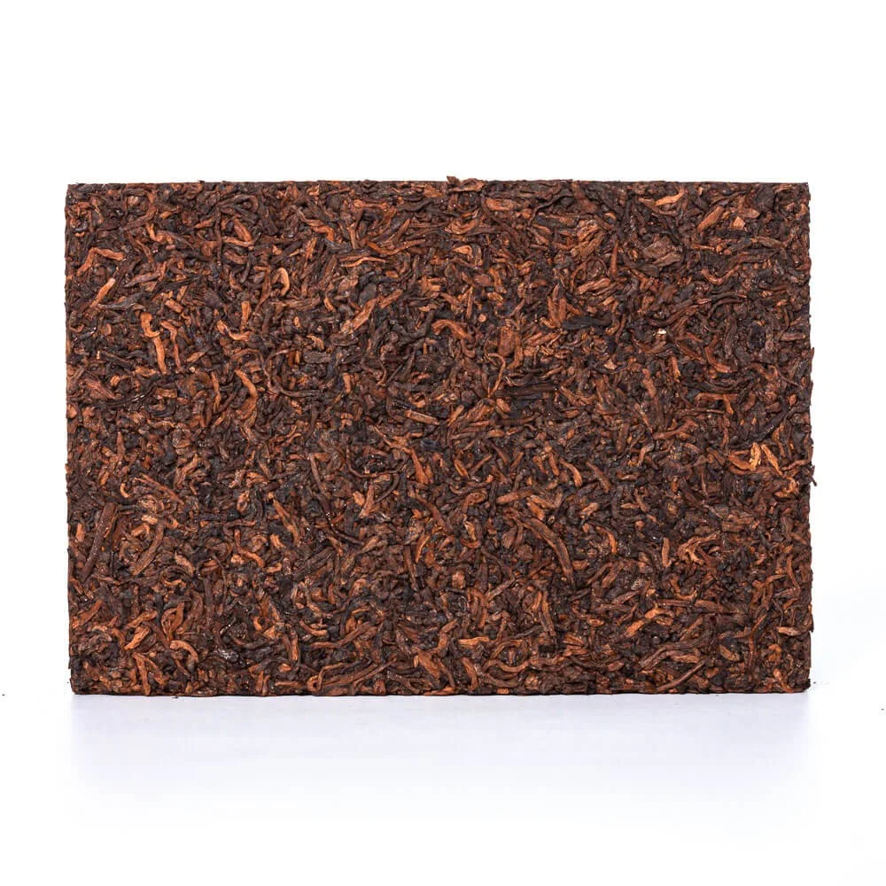 Nogatavināta Pueras Tēja Yong Zhen Guntin Shu 250g ķiegielis T.Ar